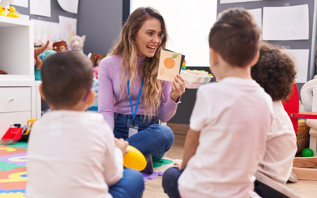 teacher with children in a montessori classroom