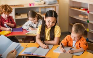 kids working on tasks at Montessori school