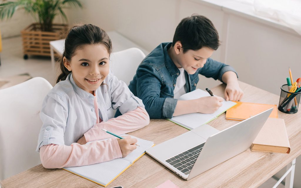 kids doing homework at home