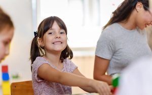 happy kid at montessori school