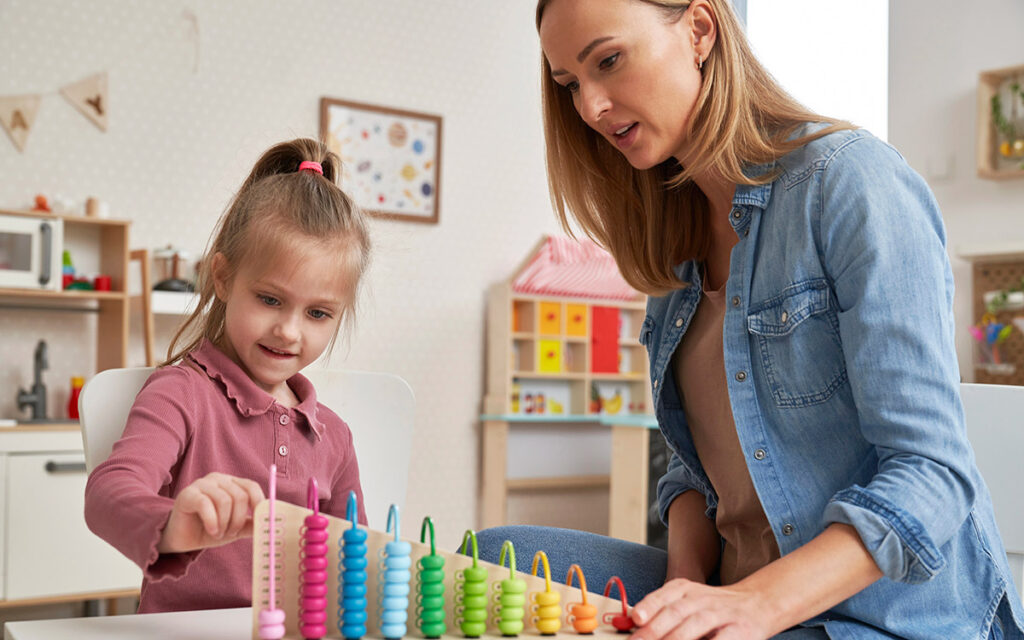 mom and daughter playing at home