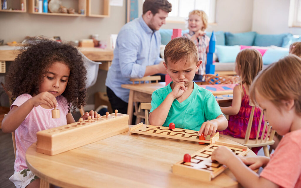 teacher and students at a montessori school