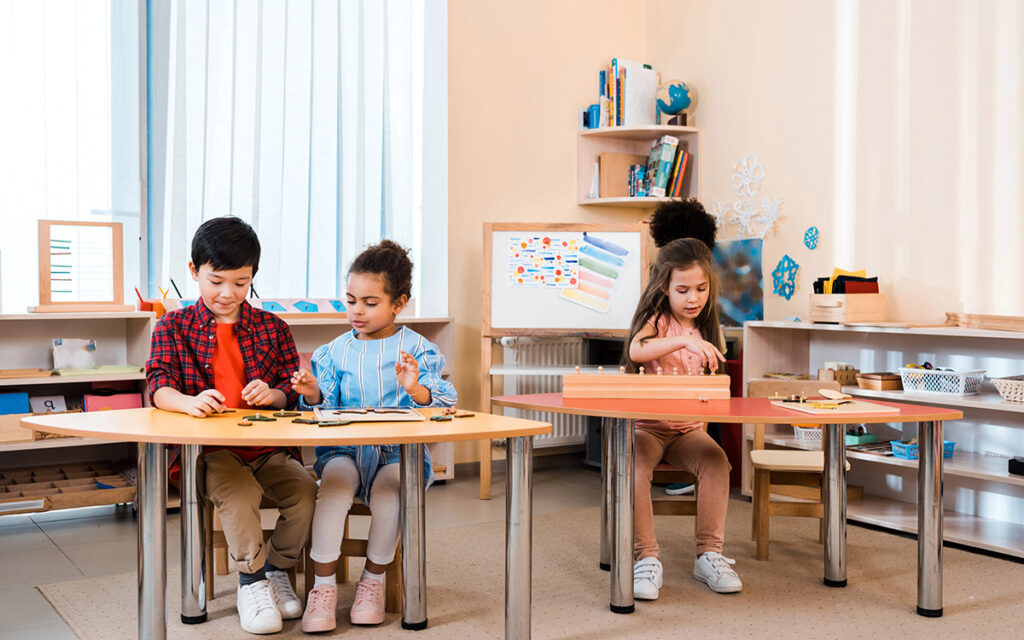 kids at a montessori school working on projects
