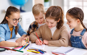 kids writing in a classroom